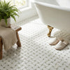AI-generated shop-the-look image showing natural stone tile styled in a room setting