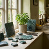 AI-generated shop-the-look image showing natural stone tile styled in a room setting