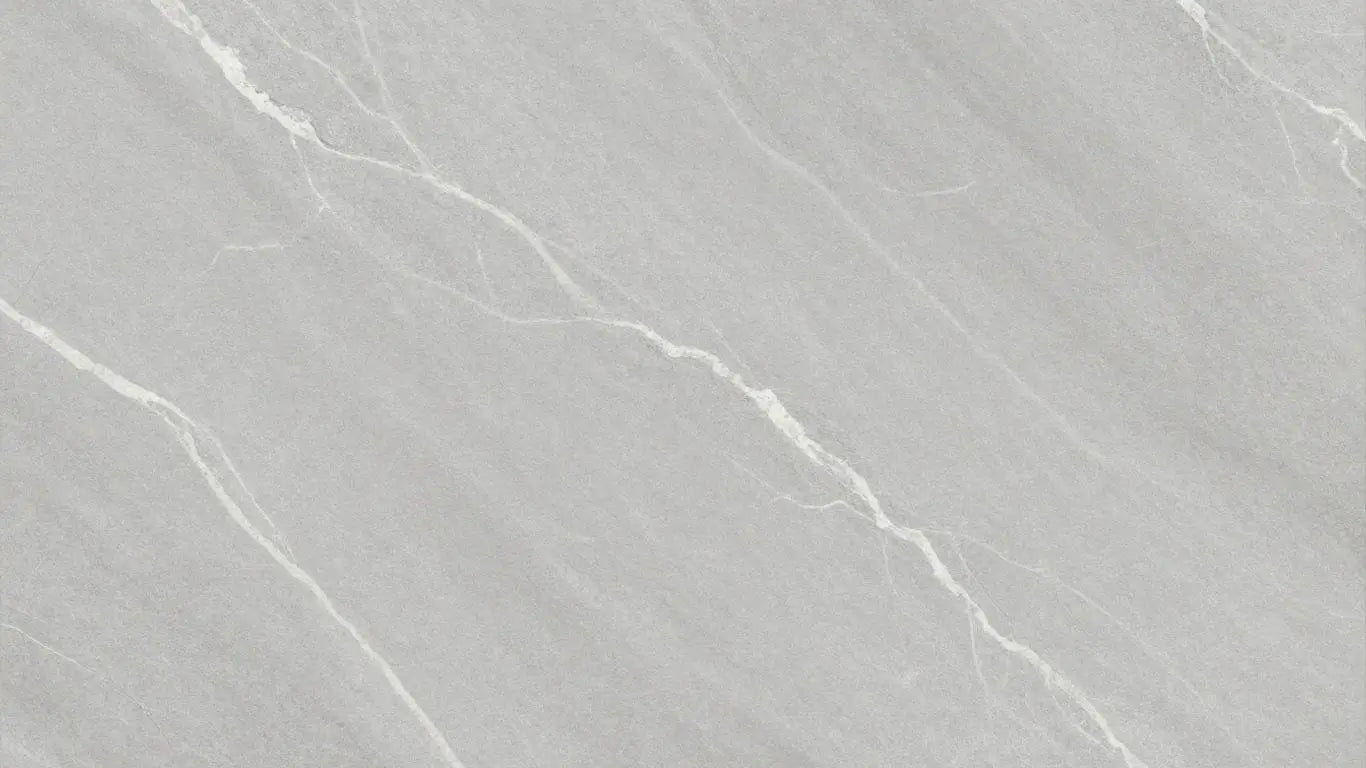 Bianco Congelato limestone tiles with subtle white veining.