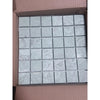 Gray marble mosaic tiles in open box, like Ming Green 2x2 polished-honed