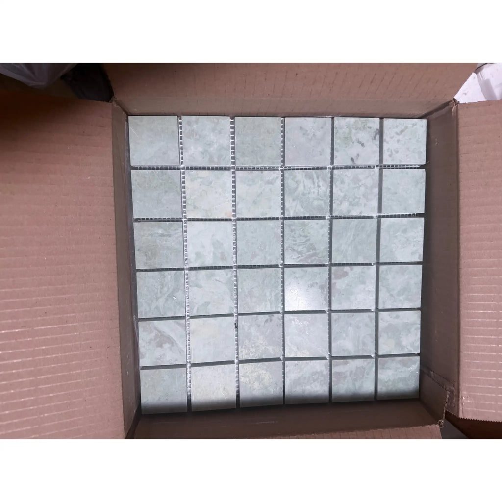 Square light gray Ming Green 2x2 mosaic marble tile with silver grout
