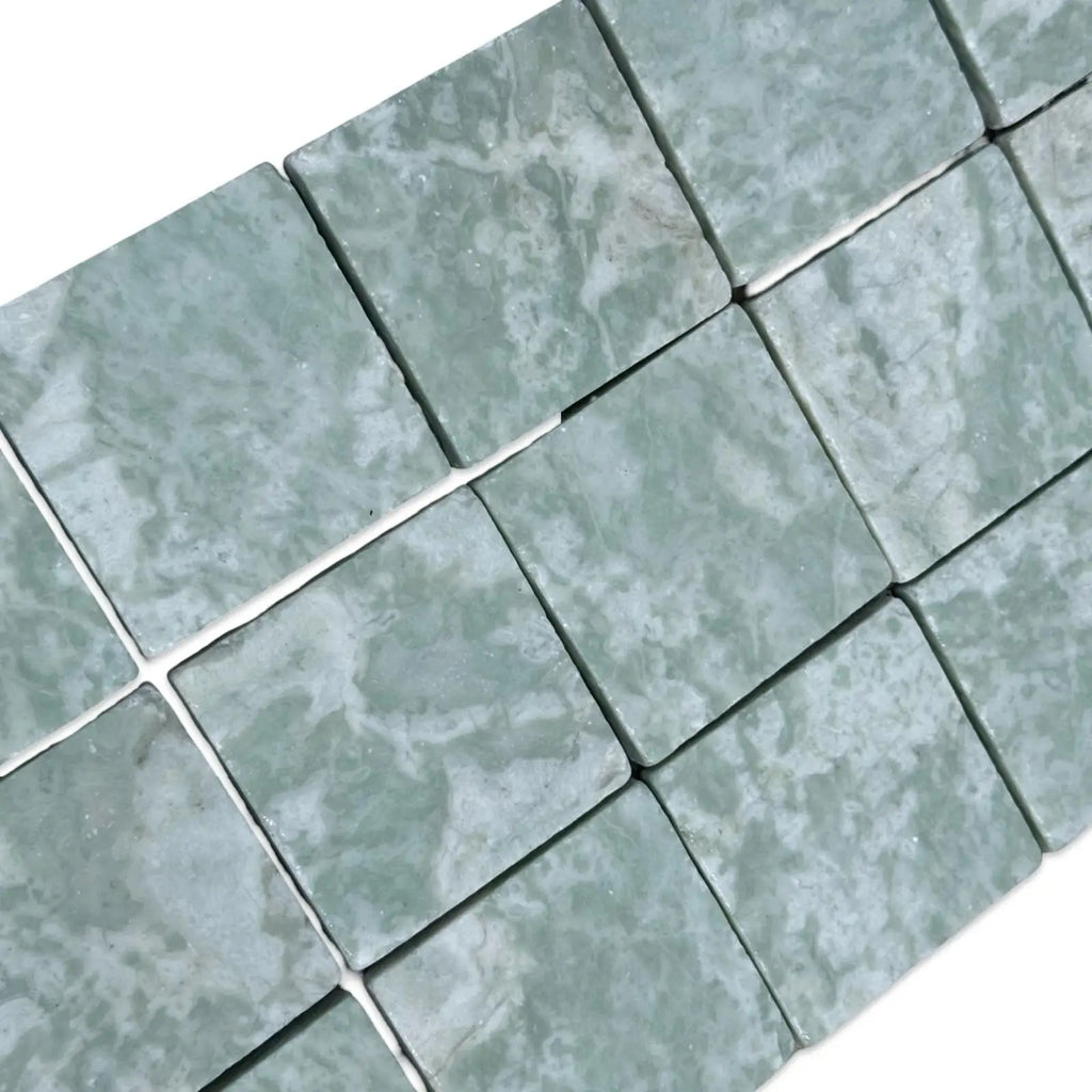 Greenish-gray variegated square tiles from Ming Green 3X3 Tumbled collection