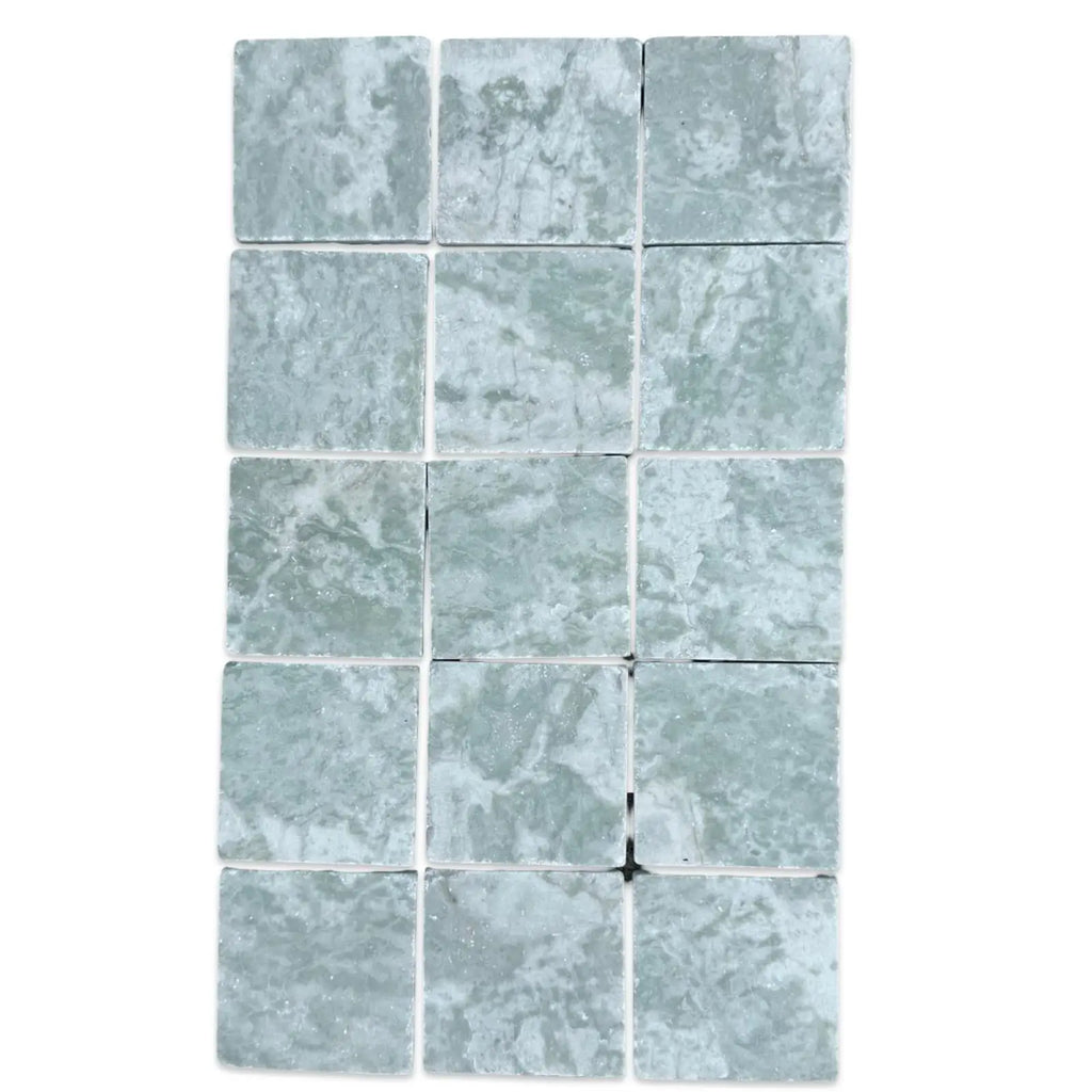 Light blue-green marble tiles with white veining in Ming Green 3X3 Tumbled product