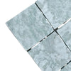 Square light gray mosaic tiles with subtle white veining for Ming Green 3X3 Tumbled