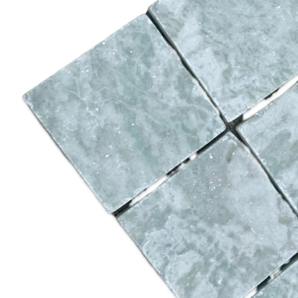 Square light gray mosaic tiles with subtle white veining for Ming Green 3X3 Tumbled