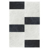 Black and white marble tile pattern in Modena Carrara White and Nero Marquina set