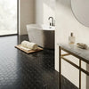 Black hexagon marble mosaic tiles in polished nero marquina with subtle white veining for elegant flooring