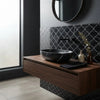Black marble bowl sink with sleek modern design made of Nero Marquina polished marble mosaic tiles