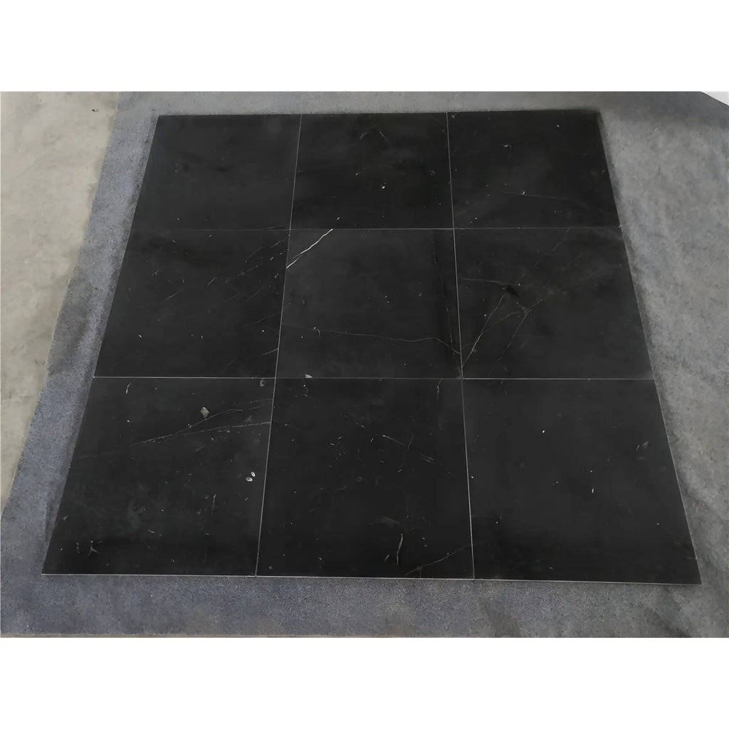 Nine black marble tiles showcasing Nero Marquina baseboard trim molding polished or honed