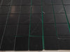 Black Nero Marquina marble coaster set with green edges and white veining