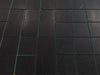Black marble tile coaster set with green accents and white veining for Nero Marquina 12x12