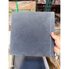 Charcoal gray Nero Marquina marble tile with natural stone texture and white grout