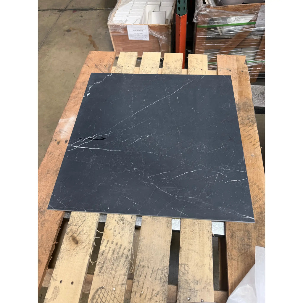 Nero Marquina black marble 24x24 polished tile with subtle white veining for elegant flooring and wall applications