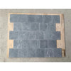 Dark gray nero marquina black marble 4x4 tumbled stone tiles with subtle white veining arranged in staggered pattern
