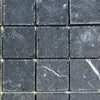 Dark gray square stone tiles of Nero Marquina Marble 2X2 Tumbled for elegant decor