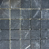 Square gray marble tiles from the Nero Marquina Marble 2X2 Tumbled collection