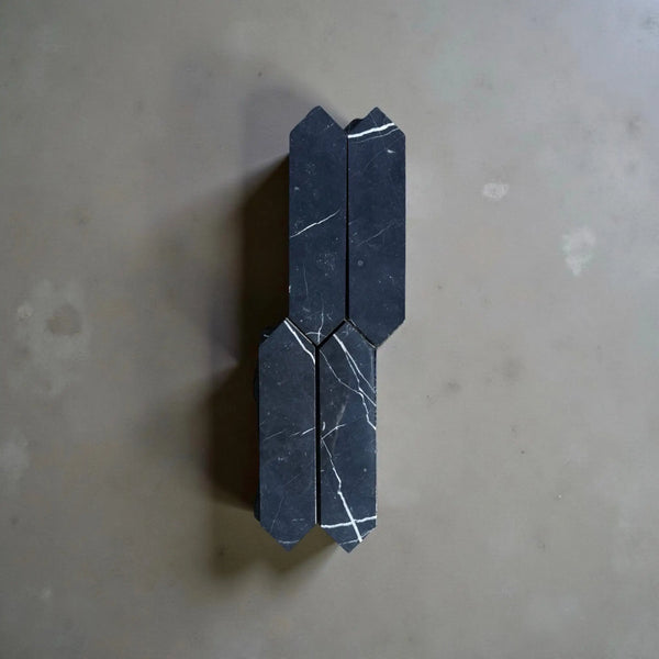 Black marble geometric tiles in Nero Marquina Marble 3’’ X 12’’ Picket Mosaic design