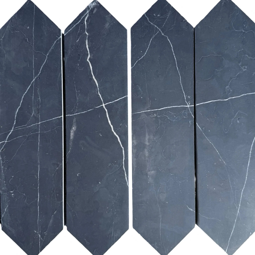 Nero Marquina Marble 3 X 12 Picket Mosaic showcasing four dark tiles with white veining