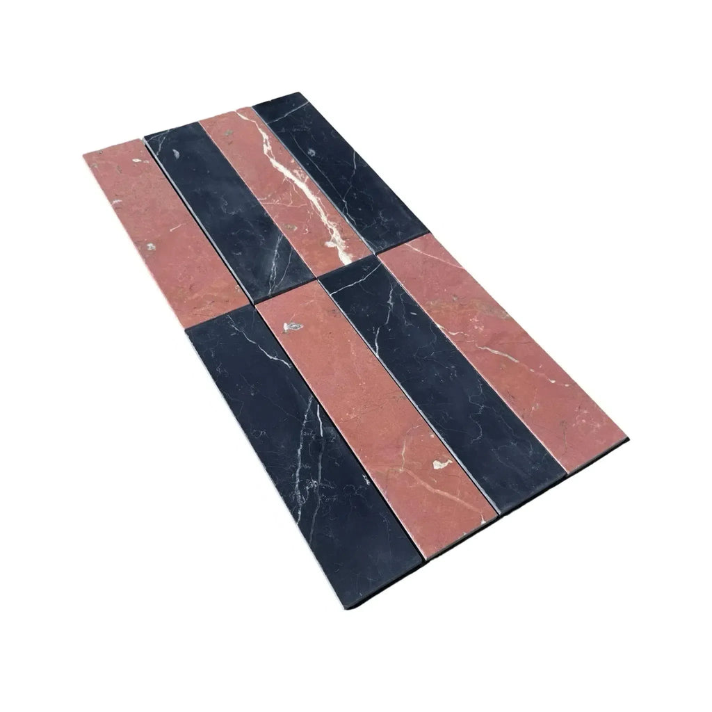 Alternating black and red marble tiles in Nero Marquina Rojo Alicante field tile design