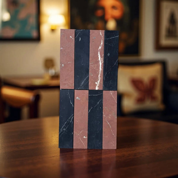 Alternating black and red marble blocks in Nero Marquina Rojo Alicante Field Tile