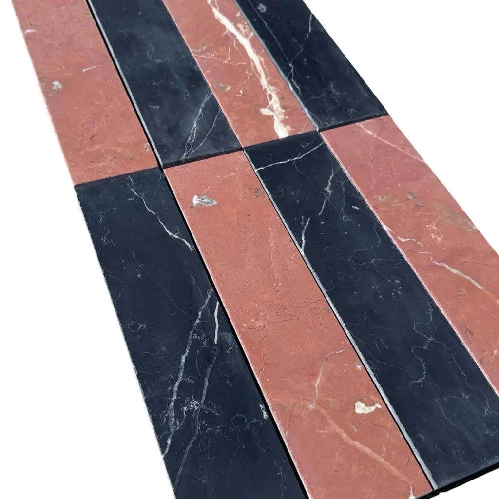 Alternating black and red marble tiles in Nero Marquina Rojo Alicante 3’’ x 12’’ Field Tile