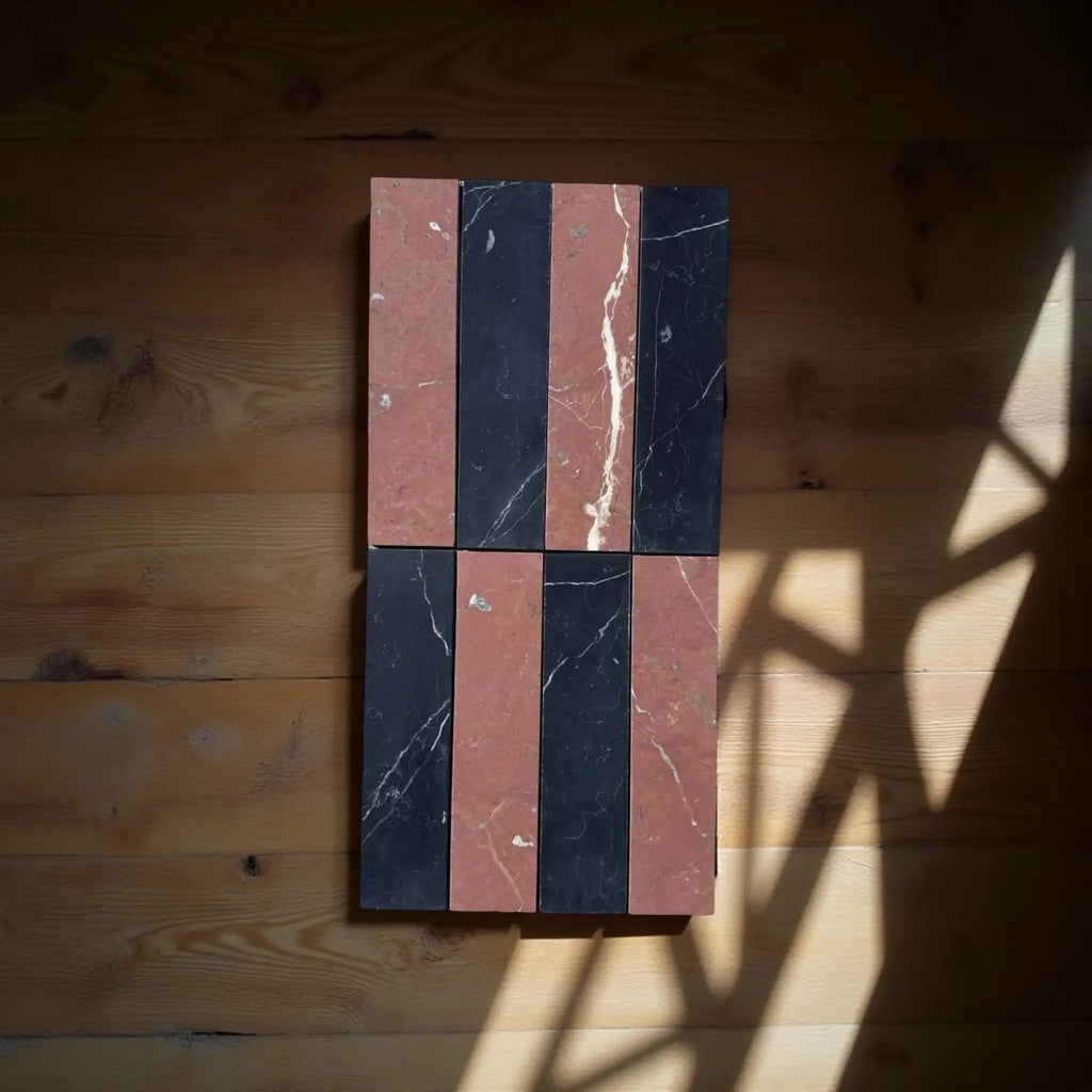Rectangular Nero Marquina and Rojo Alicante tiles in black and terracotta design