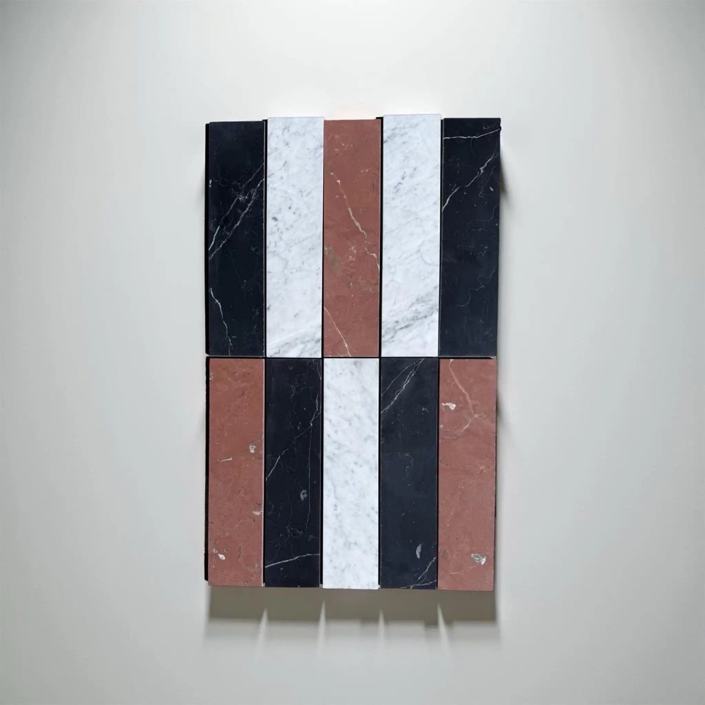 Rectangular marble tile arrangement featuring Nero Marquina, Rojo Alicante, and Carrara White