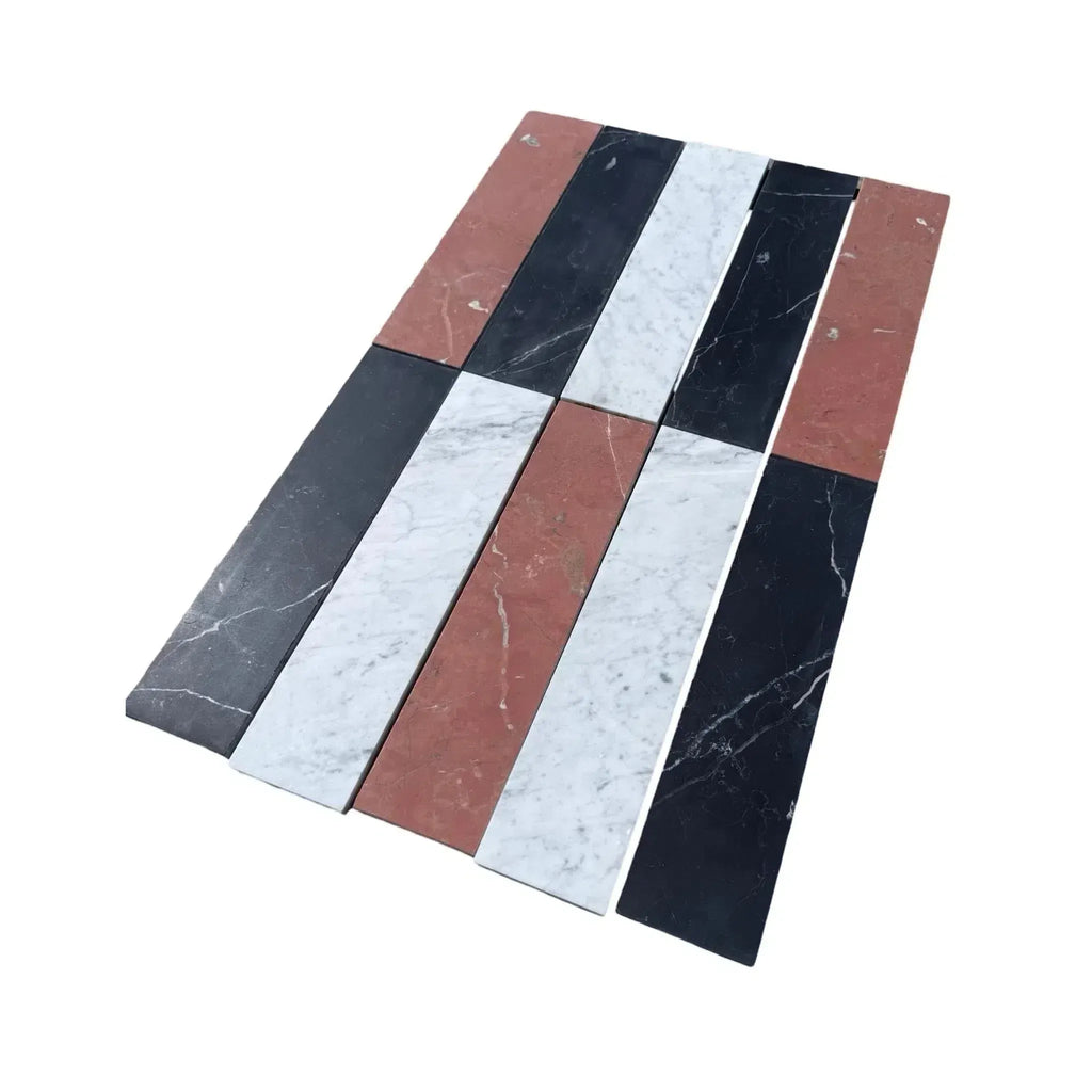 Rectangular marble tiles in alternating colors of Nero Marquina, Rojo Alicante, and Carrara White