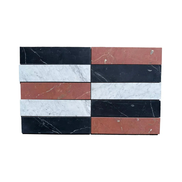 Rectangular marble tiles in contrasting colors of Nero Marquina, Rojo Alicante, and Carrara White