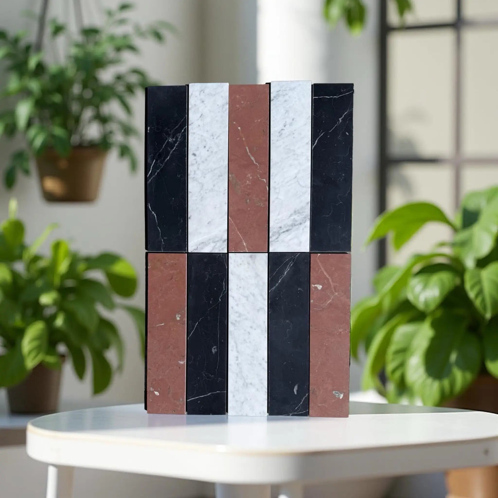 Stacked marble-patterned blocks in Nero Marquina, Rojo Alicante, Carrara White tile