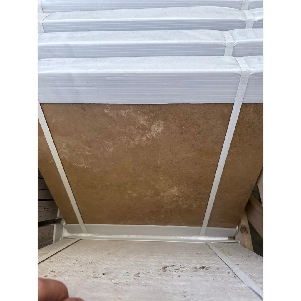 Stacked Noce Brown Travertine 18x18 tiles with protective wrapping for flooring or walls