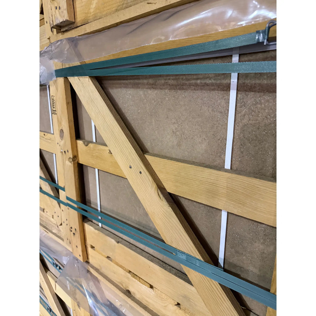 Teal woven strap with white plastic fasteners on Noce brown travertine frame