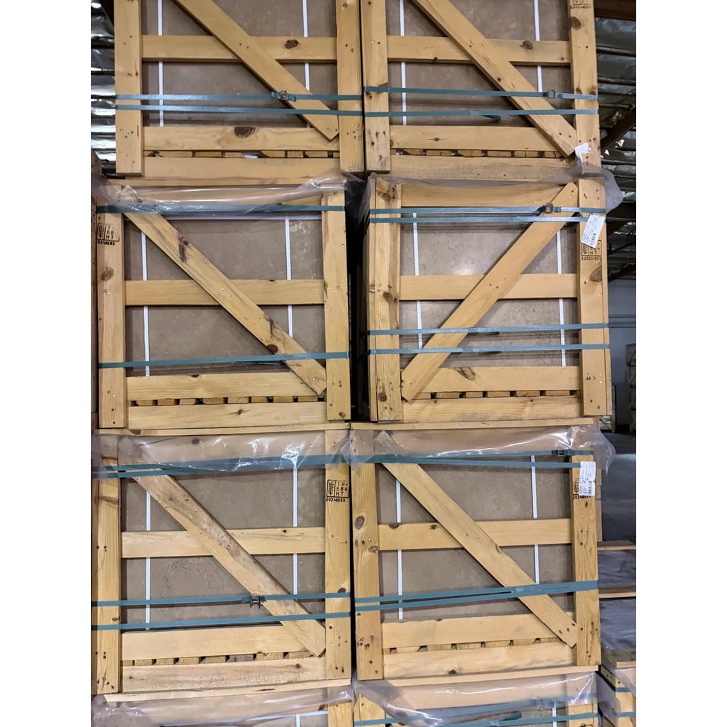 Noce brown travertine 24x24 cross-cut barn door with metal hardware and plastic wrap