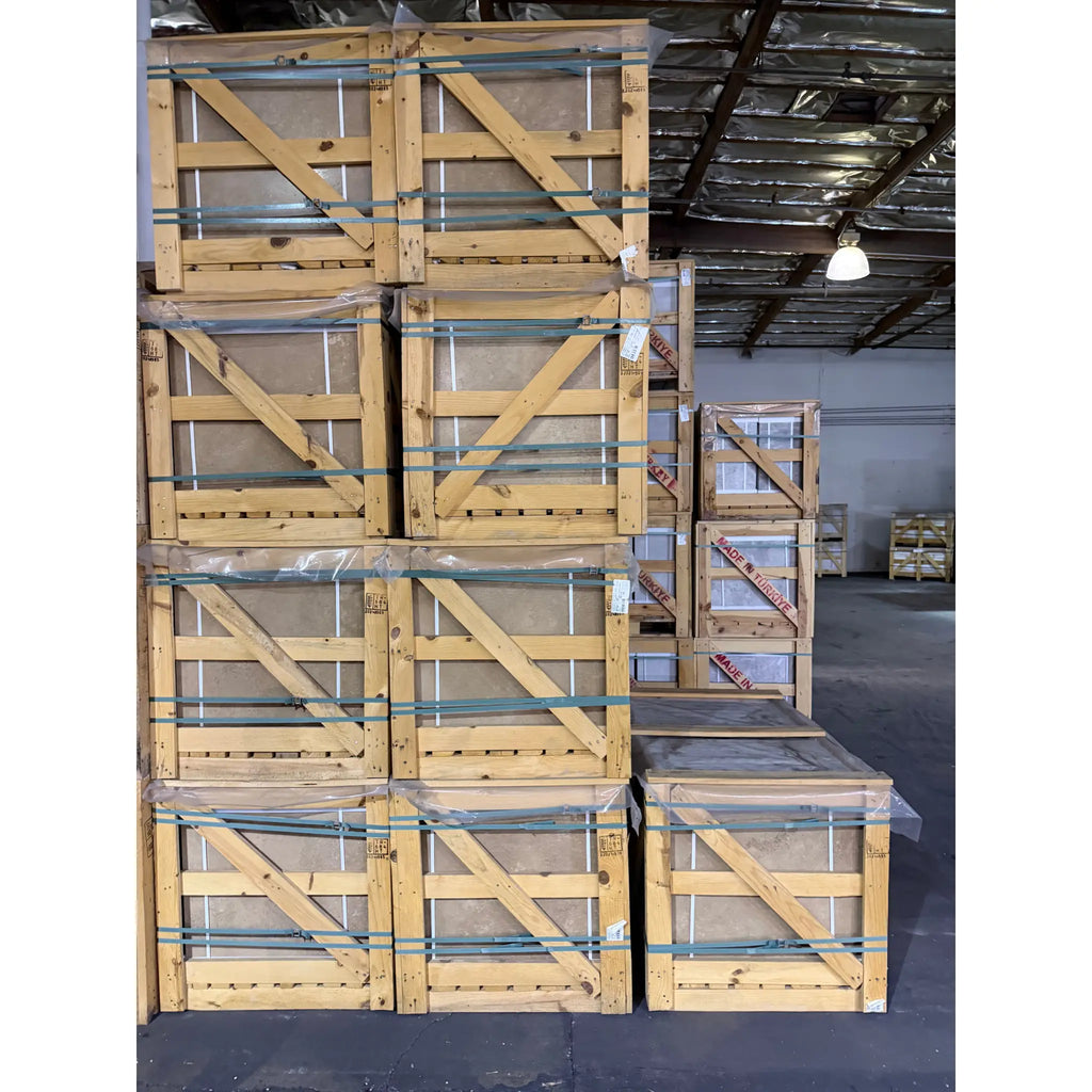 Noce brown travertine 24x24 cross-cut tile in wooden shipping crate