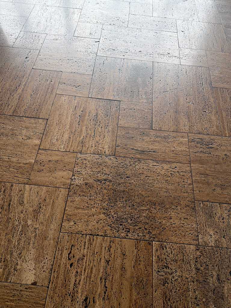 Noce Exotic Vein-Cut Travertine herringbone tiles, brushed unfilled edges