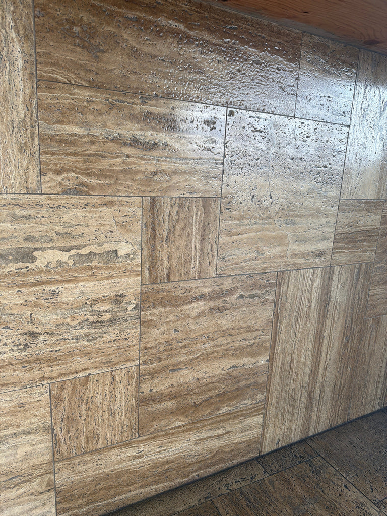 Tan and beige Noce Exotic Vein-Cut Travertine tiles in Versailles pattern, brushed edge