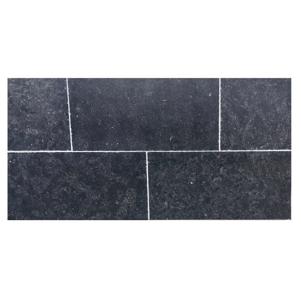Obsidian Ash 16x24 limestone brushed dark gray rectangular tiles with speckled texture and white grout