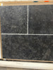 Obsidian Ash 16x24 honed limestone tile with black texture, white veining, matte finish
