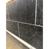 Obsidian Ash 16x24 honed limestone tiles with black texture and white grout