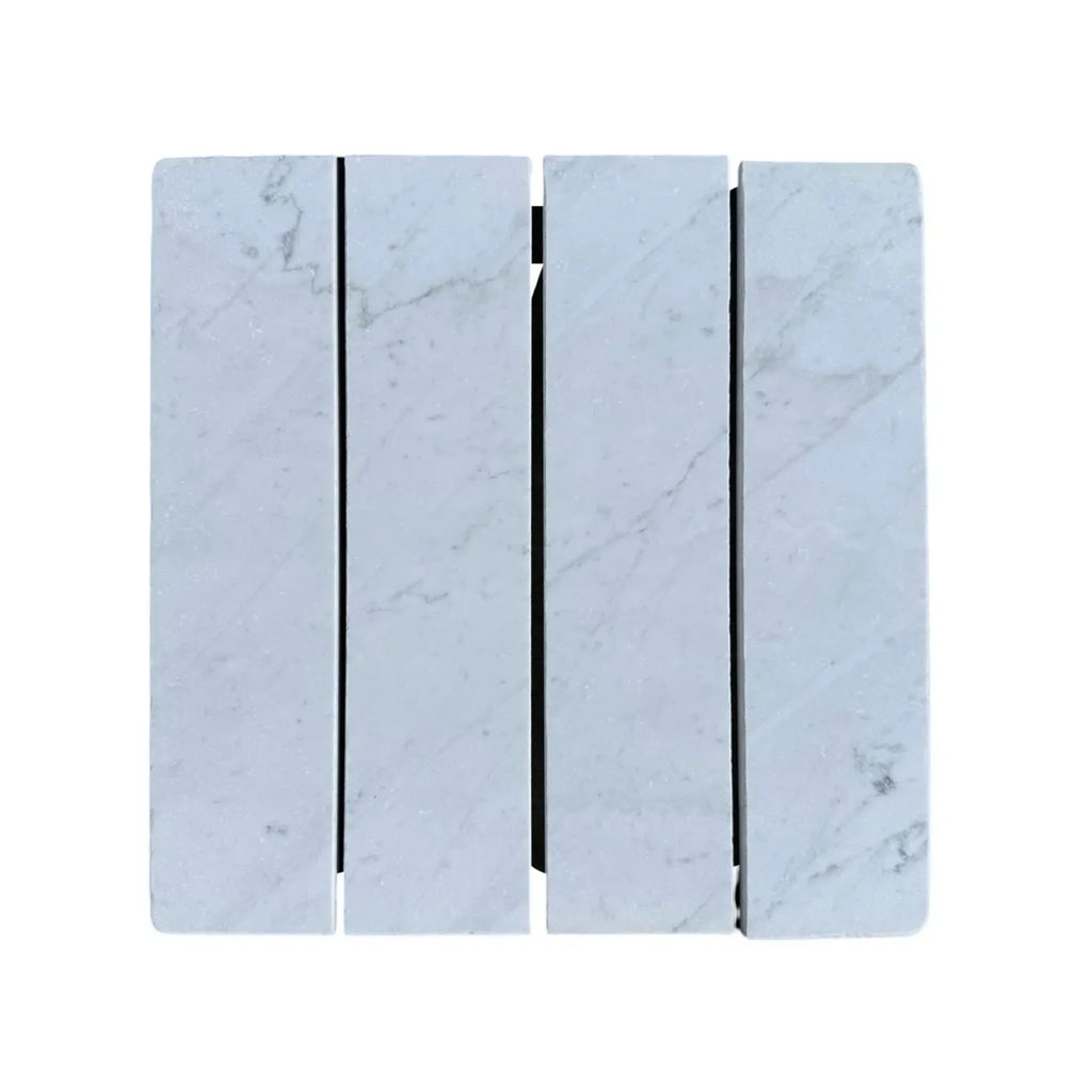 Marble-patterned radiator featuring Oriental White 3’’ X 12’’ Field Tile design