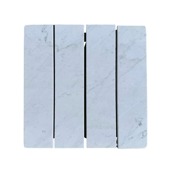 Marble-patterned radiator featuring Oriental White 3’’ X 12’’ Field Tile design