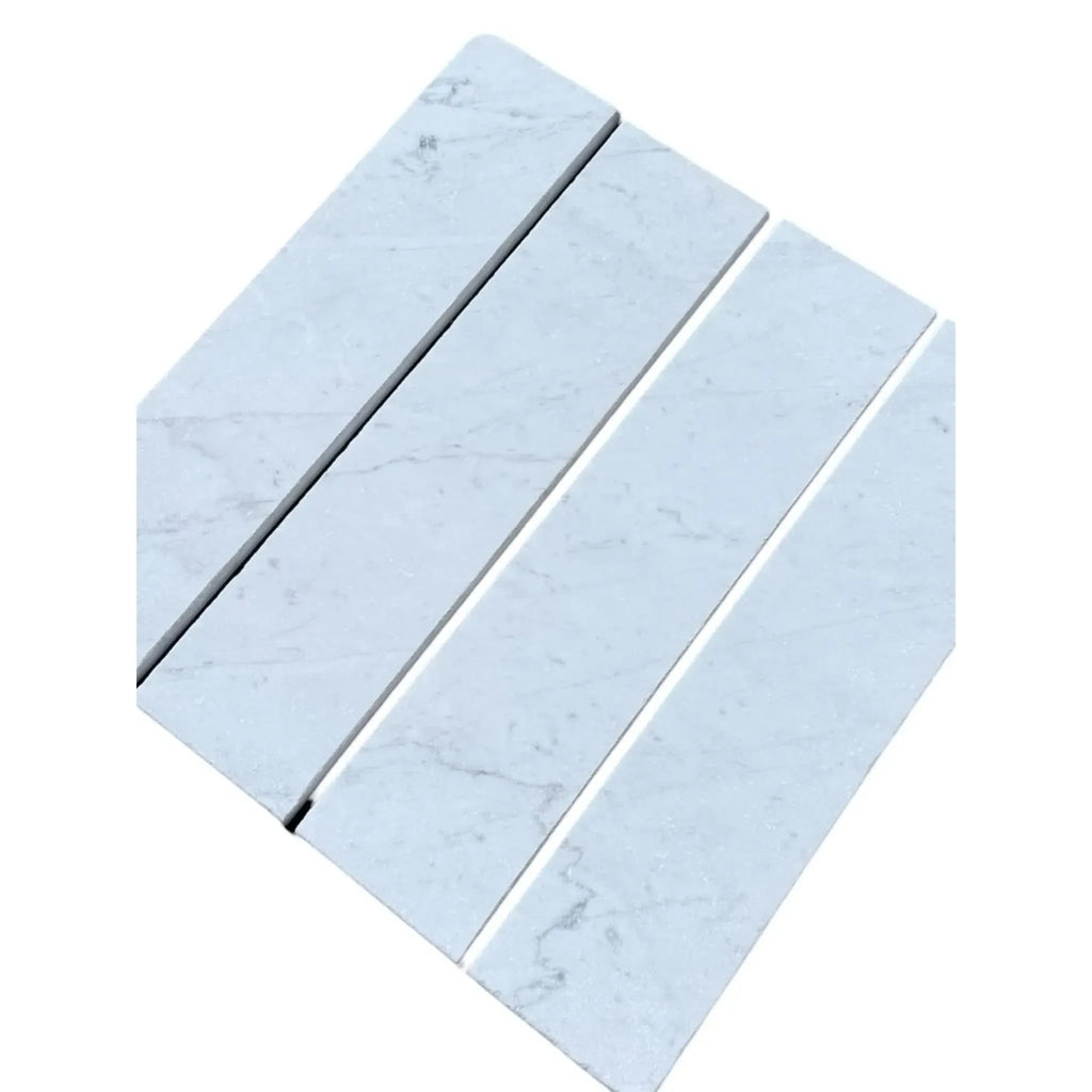 Rectangular marble tiles in Oriental White 3’’ X 12’’ field tile design