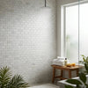 White marble-effect oriental white asian statuary 1x2 marble mosaic polished subway tile shower wall with modern design