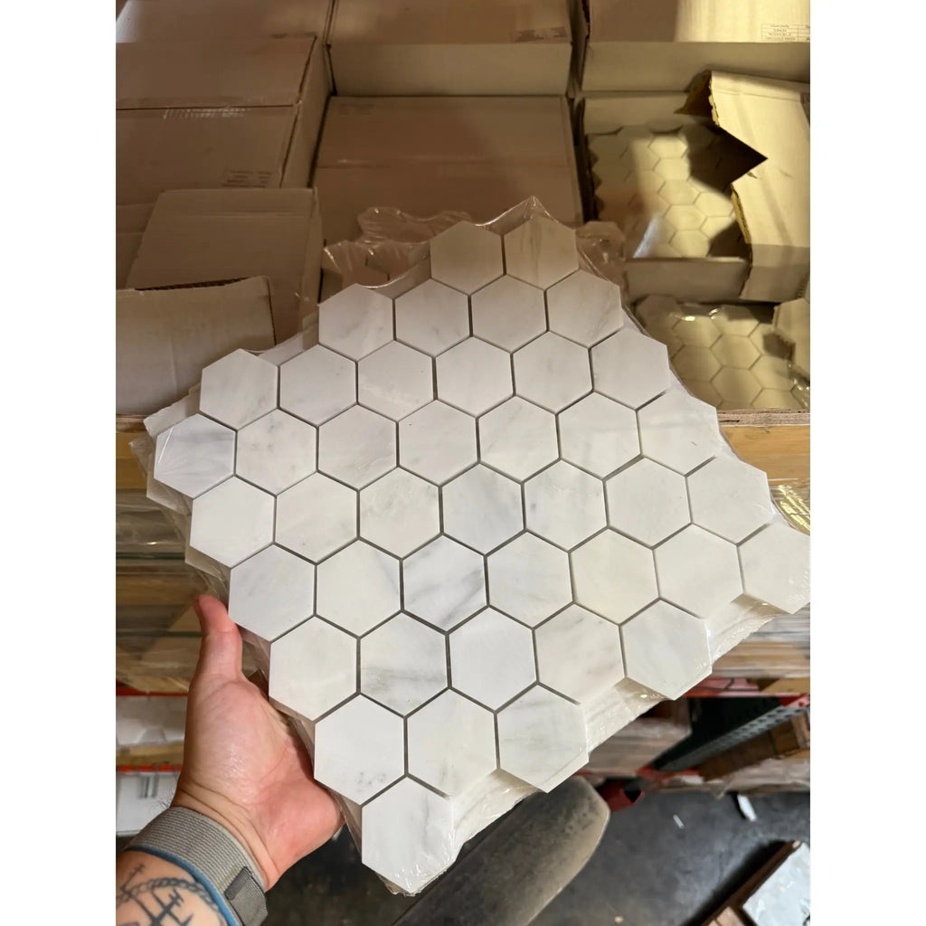 White hexagon marble tile sheets from Oriental White Asian Statuary 2 inch mosaic
