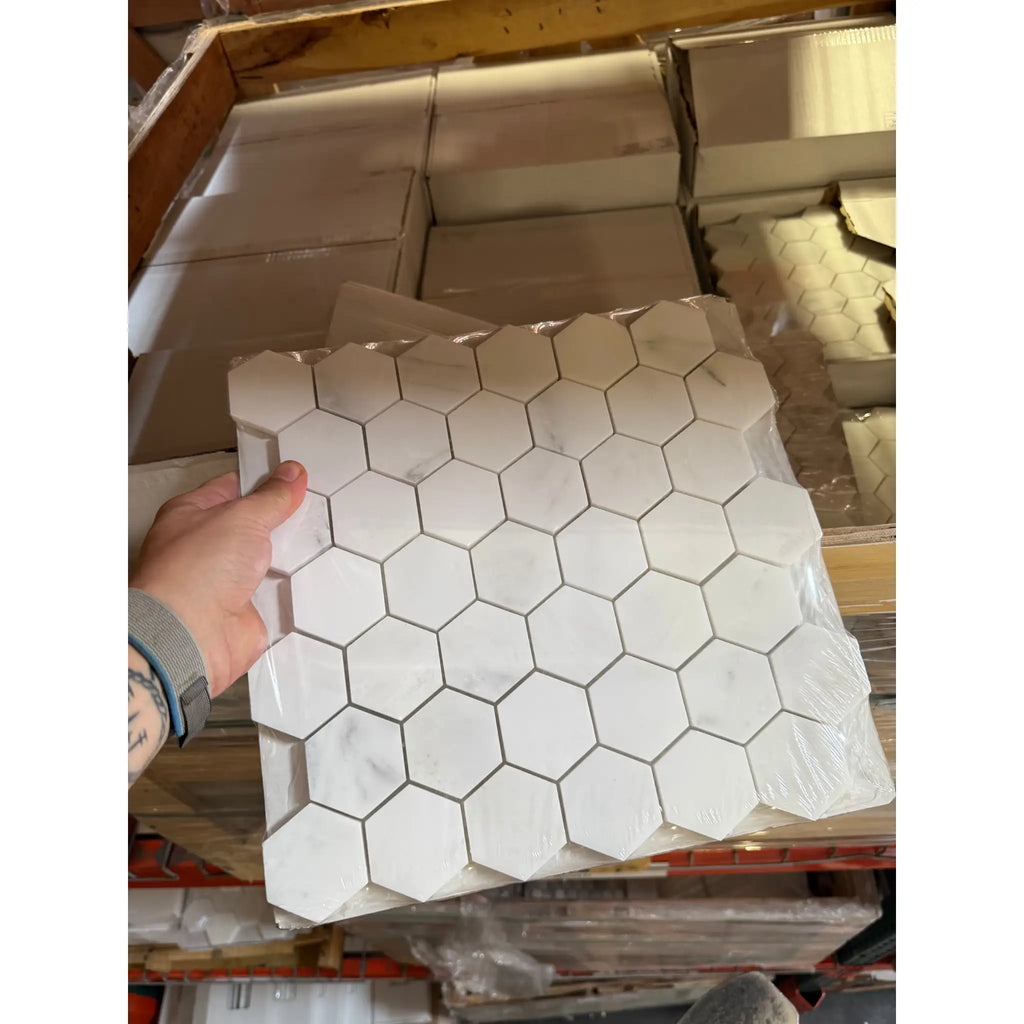 Hexagonal white marble tile sheet from Oriental White Asian Statuary marble mosaic collection