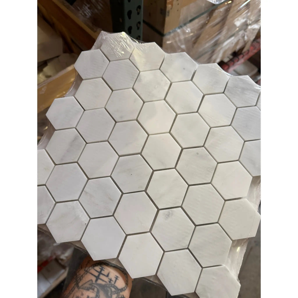 Hexagonal white marble tiles from Oriental White Asian Statuary Marble Mosaic collection