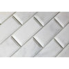 White beveled subway tile in Oriental White Asian Statuary marble mosaic design