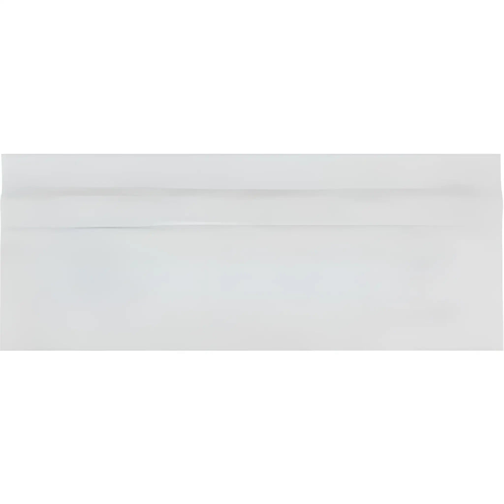 White business envelope displayed with Oriental White Asian Statuary baseboard trim