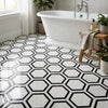 White marble-effect hexagon floor tiles with bold black geometric marble mosaic borders polished or honed finish
