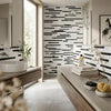 Modern bathroom featuring oriental white asian statuary bamboo sticks marble mosaic with black and white striped tiles